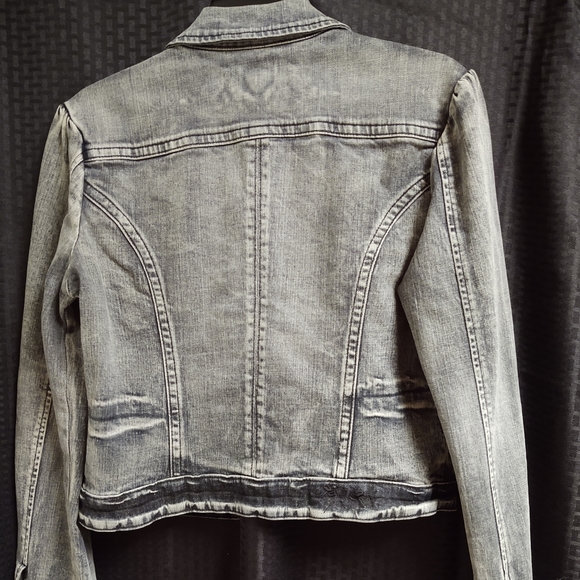 Stonewashed jean jacket with accent buttons. - Picture 2 of 7